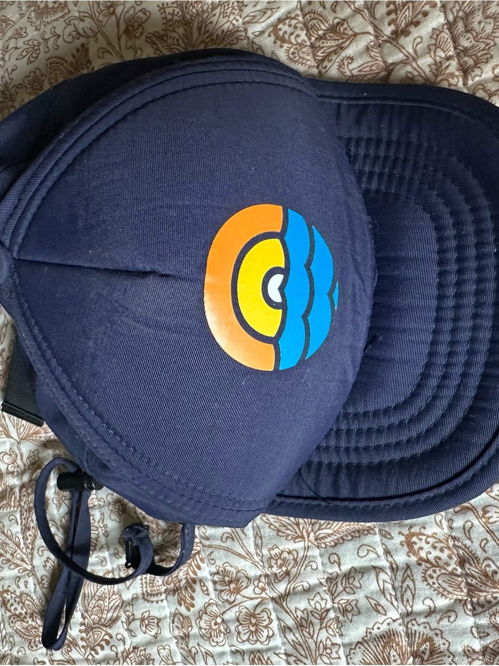 Bitty Brah adjustable Infant Cap with Colorful Orange, Yellow & Blue Ocean Badge